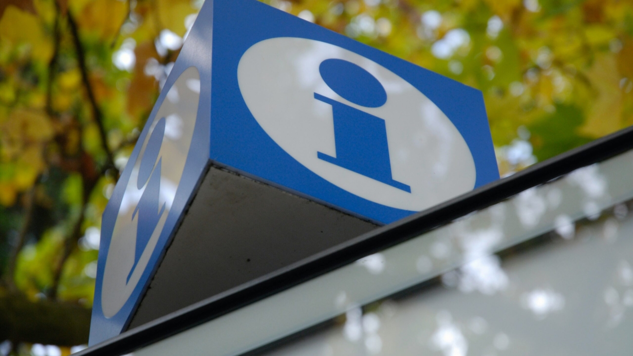 Blue and white information sign